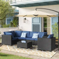 Ensemble de mobilier de patio 7 pièces avec coussins bleus et table basse