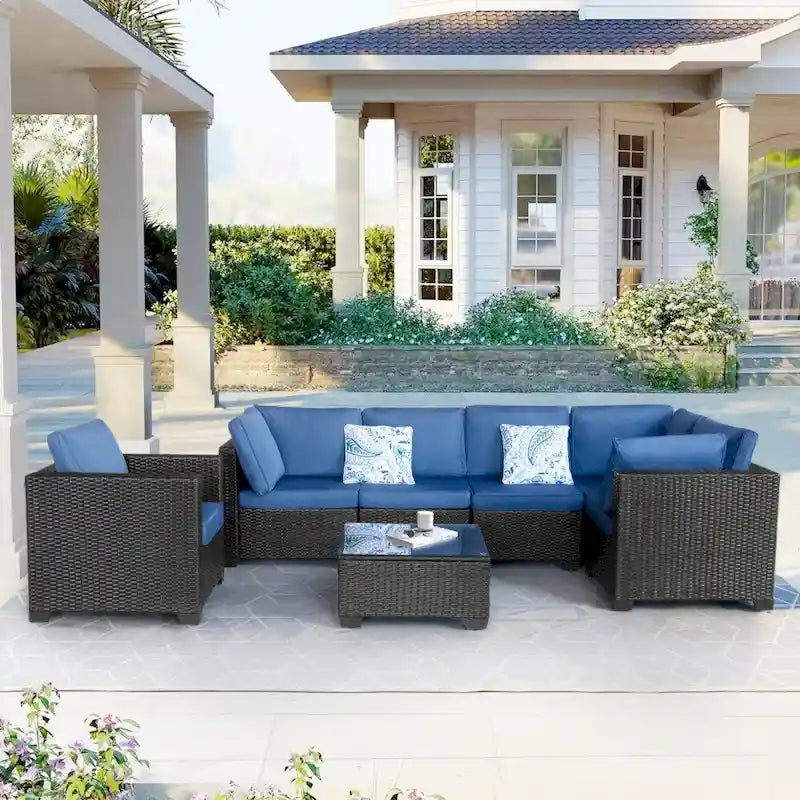 Ensemble de mobilier de patio 7 pièces avec coussins bleus et table basse