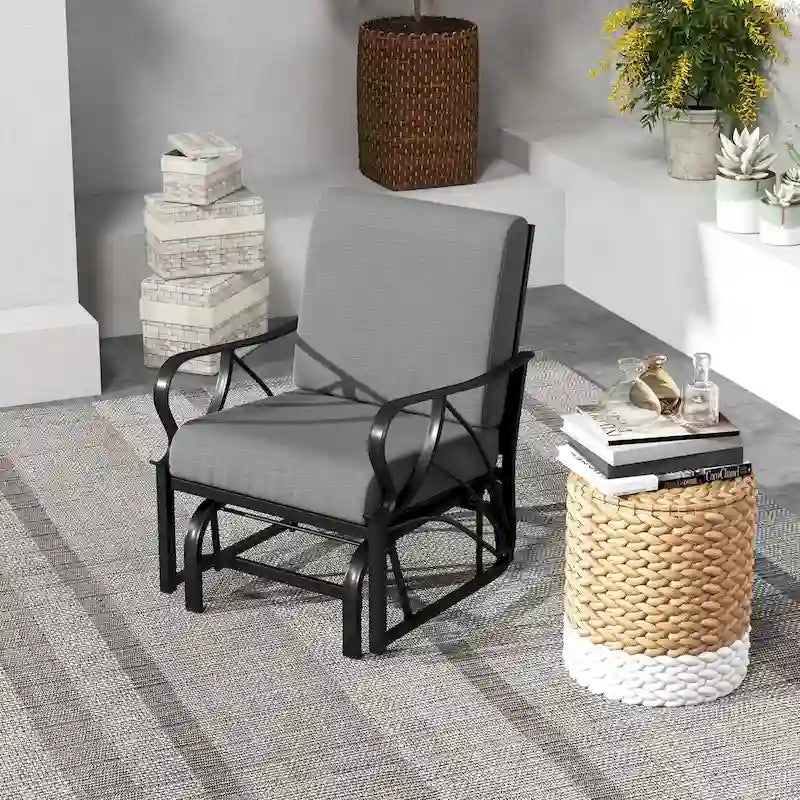 Fauteuil à bascule de patio Costway avec coussin, structure métallique robuste et lisse - Voir les détails