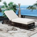 Fauteuil de jardin en rotin à 5 positions avec roulettes et coussin inclus.