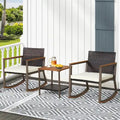 Ensemble bistro 3 pièces à bascule, mobilier de jardin en rotin comprenant chaises de conversation, table basse et coussins pour balcon, terrasse ou piscine.