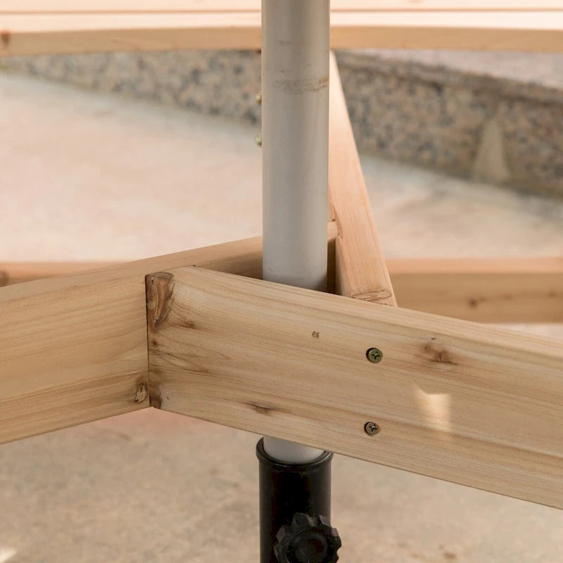 Table de pique-nique ronde d'extérieur en bois avec bancs intégrés