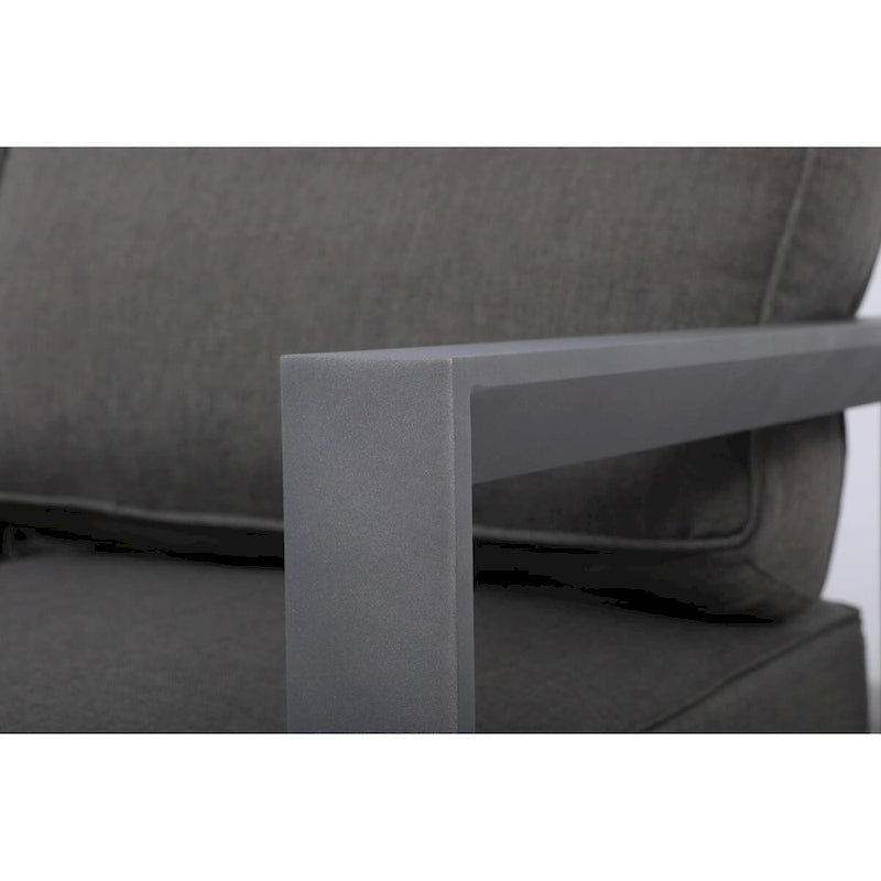 Canapé Cabo en aluminium avec structure grise et coussin.