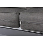 Canapé Cabo en aluminium avec structure grise et coussin.