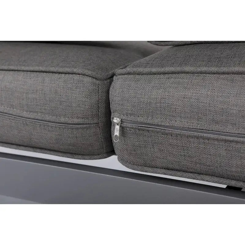 Canapé Cabo en aluminium avec structure grise et coussin.