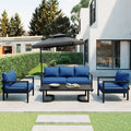 Ensemble de patio d'extérieur en acier 4 pièces avec table et coussins