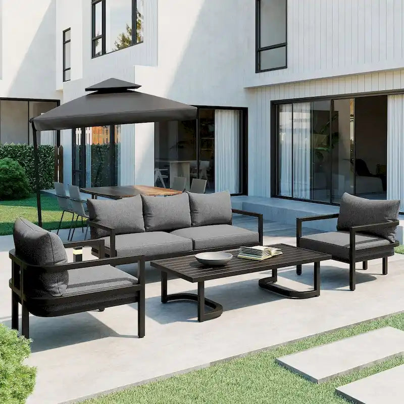 Ensemble de patio d'extérieur en acier 4 pièces avec table et coussins