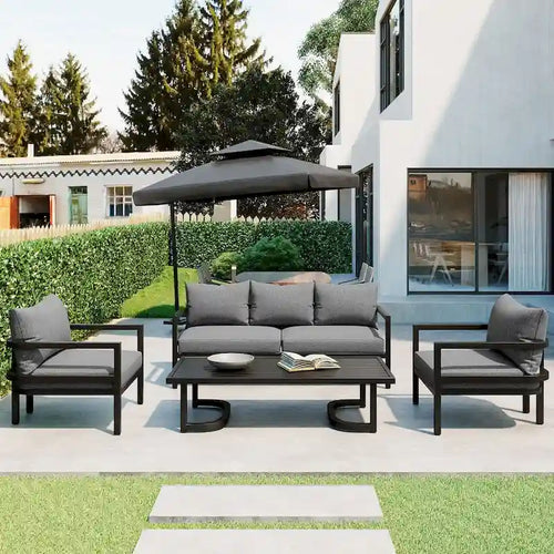 Ensemble de patio d'extérieur en acier 4 pièces avec table et coussins