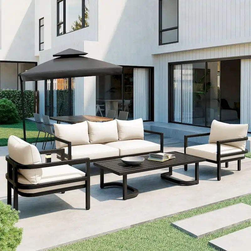 Ensemble de patio d'extérieur en acier 4 pièces avec table et coussins