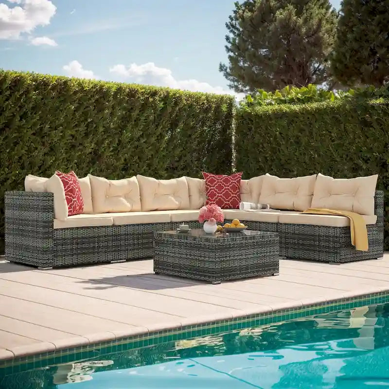 Ensemble de conversation Moasis 7 pièces pour patio, comprenant un canapé d'angle extérieur avec coussins et une table basse, idéal pour le jardin, le balcon ou la cour.
