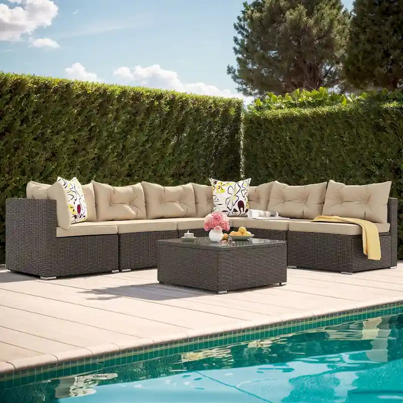 Ensemble de conversation Moasis 7 pièces pour patio, comprenant un canapé d'angle extérieur avec coussins et une table basse, idéal pour le jardin, le balcon ou la cour.