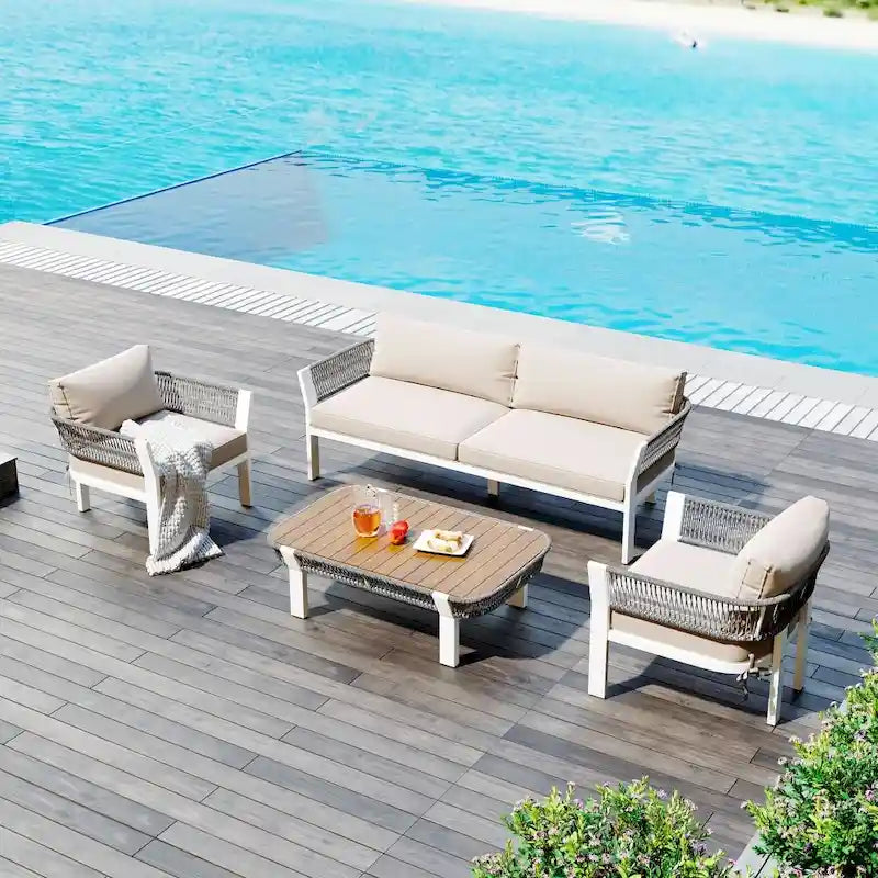 Ensemble de conversation extérieur 4 pièces avec table basse et coussins moelleux