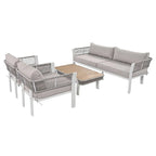 Ensemble de conversation extérieur 4 pièces avec table basse et coussins moelleux