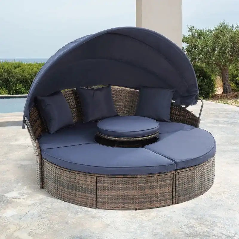 Lit de jour rond d'extérieur en rotin tressé avec auvent, table basse