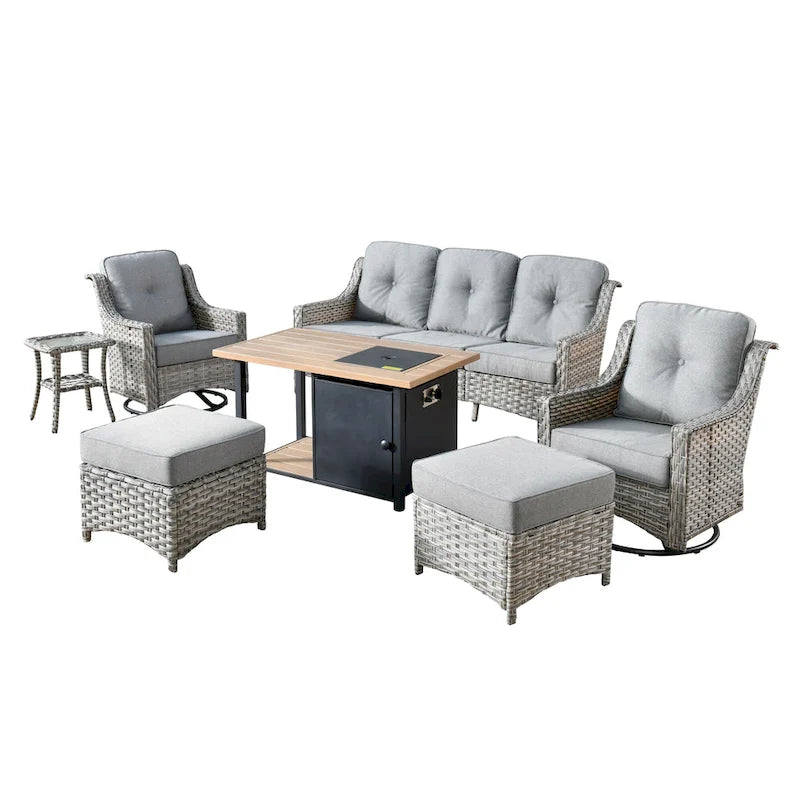 Ensemble de 7 chaises pivotantes incurvées en osier d'extérieur OVIOS avec table de feu