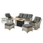 Ensemble de 7 chaises pivotantes incurvées en osier d'extérieur OVIOS avec table de feu