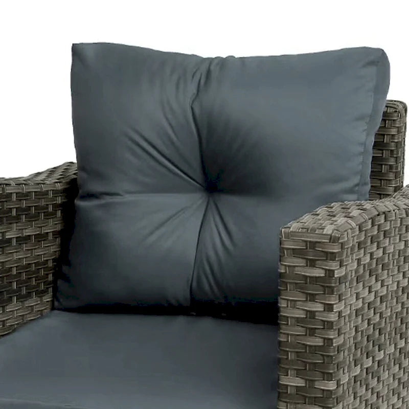 Ensemble de conversation extérieur 3 pièces avec fauteuil pivotant et coussins en rotin.