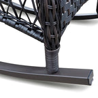 Fauteuil à bascule d'extérieur en rotin avec coussin et structure en métal thermolaqué